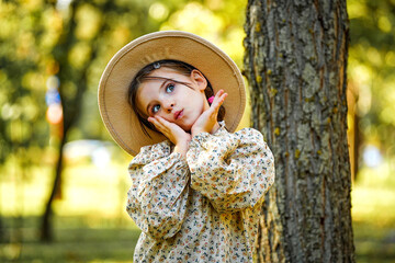 portrait of a girl in autumn forest park 