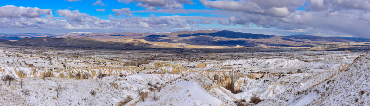 Panoramic view of snow covered Devrent Valley near Goreme at Nevsehir Province, Cappadocia, Turkey