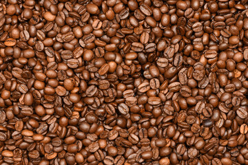 Roasted coffee beans background top view