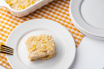 Cheesy Pinoy Maja Blanca - A dessert with a gelatinous texture primarily made from coconut milk, commonly referred to as coconut pudding. It is typically served during fiestas and holiday celebrations