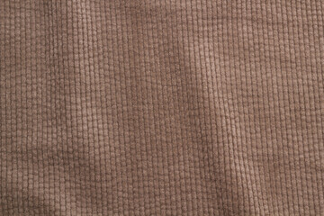ribbed corduroy background. corduroy fabric texture. Textile close up flat