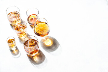 Strong alcohol drink. Cognac, whisky, rum, tequila at white background.