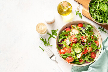 Naklejka premium Healthy food, Dash diet, keto diet. Green salad with grilled chicken breast, Top view on white background.