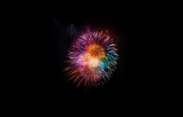 Fototapeta premium Colorful firework display exploding in the night sky.