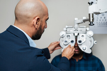 Optometrist Conducting Eye Exam with Advanced Equipment in Professional Setting