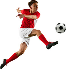 Focused football player, in training session, works on controlling ball against transparent...