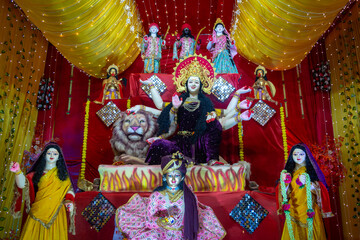 A beautiful idol of Maa Durga being worshipped at a pandal during Navratri. Navratri is biggest...
