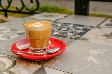 coffee in a transparent cup. cortado