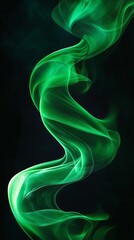 Naklejka premium Green smoke forming abstract shapes on black background
