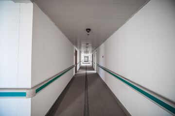 Modern Hospital Corridor With White Walls