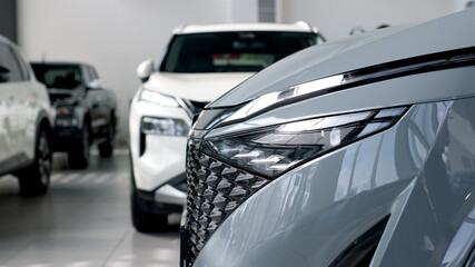 Close-up of advanced car headlight technology in a modern car interior. The sleek design...