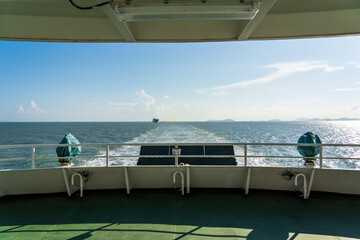 Fototapeta premium Scenic Maritime Voyage: Embracing the Open Water from the Ship's Deck
