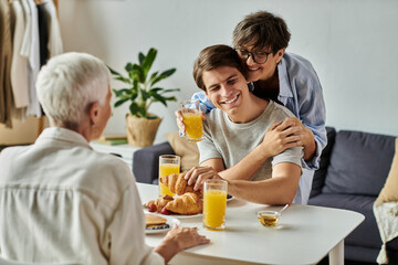 A loving family enjoys breakfast, sharing laughter and joy in a warm, inviting atmosphere.