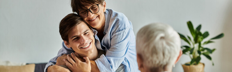 Loving LGBTQ family enjoys breakfast together, filled with joy and connection at home.