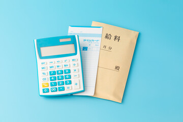 給料とタイムカードのイメージ01