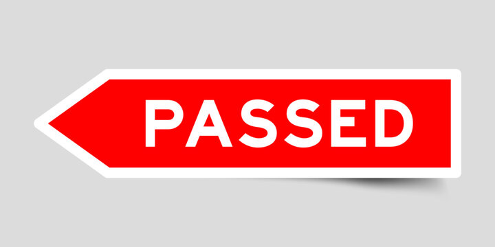 Red color arrow shape sticker label with word passed on gray background