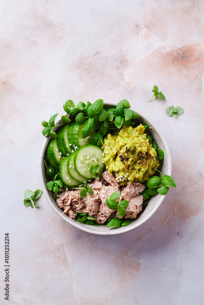 Canvas Prints Asian salad bowl with tuna, avocado and cucumber.