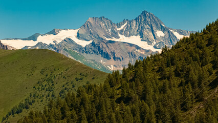 Alpine summer view with the legendary Mount Gro&szlig;glockner in the background at Mount Goldried, Matrei, Eastern Tyrol, Austria