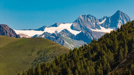 Alpine summer view with the legendary Mount Gro&szlig;glockner in the background at Mount Goldried, Matrei, Eastern Tyrol, Austria