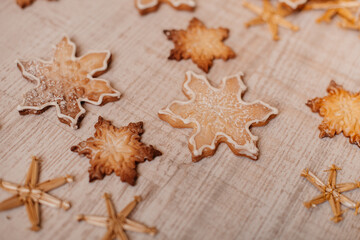 A golden-baked Christmas cookies in star shapes, sprinkled with powdered sugar, embodying the spirit of holiday baking