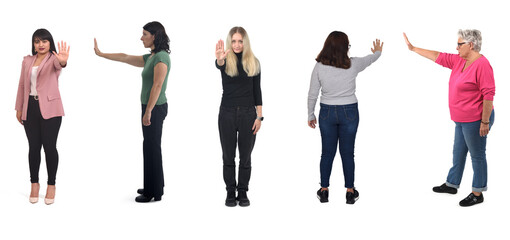 group of various  woman showing the stop sign with their hands on white background