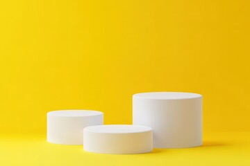 White Cylinders on Yellow Background