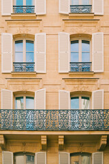 Windows with Window Shutters and a Balcony on a Neoclassic Baroque Building Facade