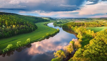 Obraz premium Aerial View of Serene Countryside River
