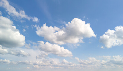 Beautiful sky with fluffy clouds, perfect for backgrounds or nature themes.