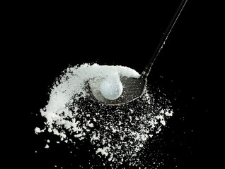 Golf Ball golfer hit snow to explode and splatter. Sand wedge golf dick ball from snow field and...