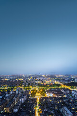Stunning Aerial View of a Vibrant Urban Cityscape at Night