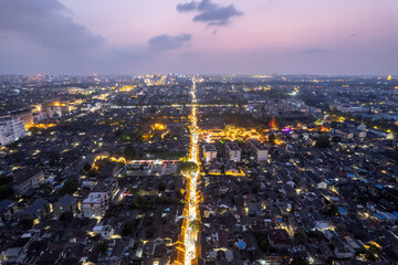 A Stunning Aerial View of a Vibrant Cityscape at Dusk