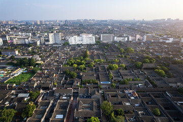 Naklejka premium Aerial View of Urban Landscape with Traditional and Modern Architecture