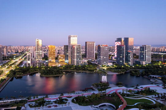 Stunning Aerial View of a Modern City Skyline at Dusk