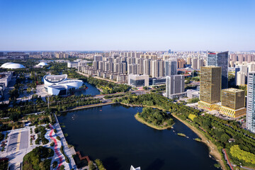 Aerial View of Modern Urban Landscape with River and Cityscape