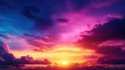 Fototapeta premium A beautiful sunset with a pink and purple sky. The sky is filled with clouds and the sun is setting