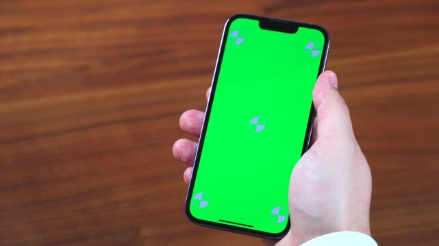 Mobile scrolling green screen. Pages and finger tapping. Vetrical customizable smartphone screen
