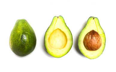 split avocado fruit isolated on white background