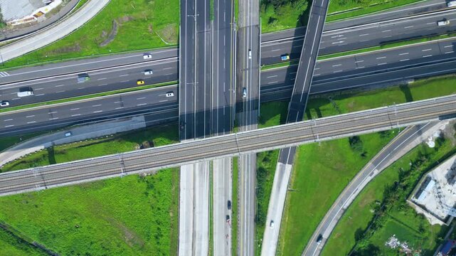 Established Aerial View of Pasir Koja Interchange, the meeting point of Soroja Toll Road, Purbaleunyi Toll Road and Jakarta-Bandung High Speed ​​Rail Line, Bandung, Indonesia