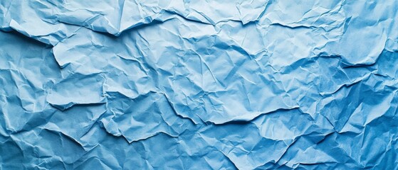 Fototapeta premium A blue paper with a rough texture
