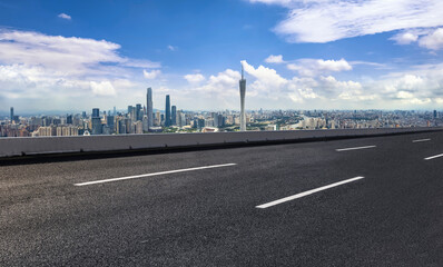Scenic Urban Skyline with Open Highway under a Bright Sky