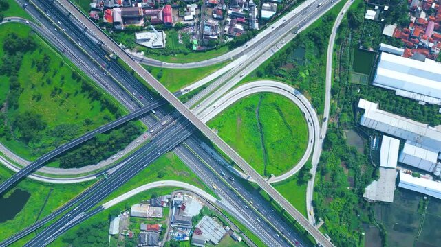 Established Aerial View of Pasir Koja Interchange, the meeting point of Soroja Toll Road, Purbaleunyi Toll Road and Jakarta-Bandung High Speed ​​Rail Line, Bandung, Indonesia