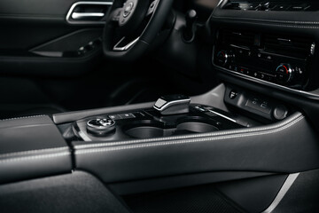 Stylish driving mode control panel in car with intuitive icons for various driving conditions....