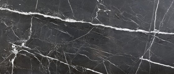 A black and white photo of a marble floor with a white line running through it