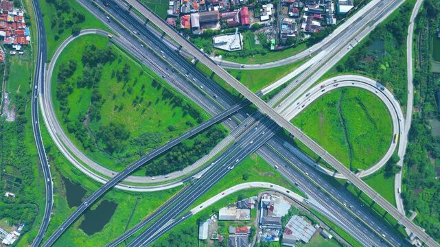 Established Aerial View of Pasir Koja Interchange, the meeting point of Soroja Toll Road, Purbaleunyi Toll Road and Jakarta-Bandung High Speed ​​Rail Line, Bandung, Indonesia