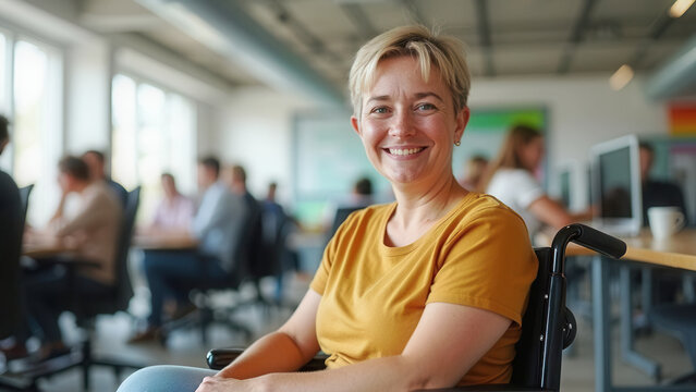 Happy lady in wheelchair at inclusive workplace