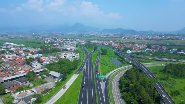 Established Aerial View of Pasir Koja Interchange, the meeting point of Soroja Toll Road, Purbaleunyi Toll Road and Jakarta-Bandung High Speed ​​Rail Line, Bandung, Indonesia