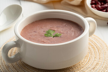 Healthy red bean soup in white bowl,quick and easy soup great source of nutrients and protein.