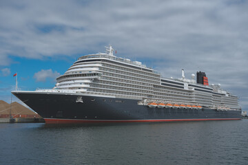 Brand new cruiseship cruise ship ocean liner Queen Anne in port of Skagen, Denmark during inaugural...