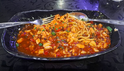 spicy sauce hot plate noodles on plate